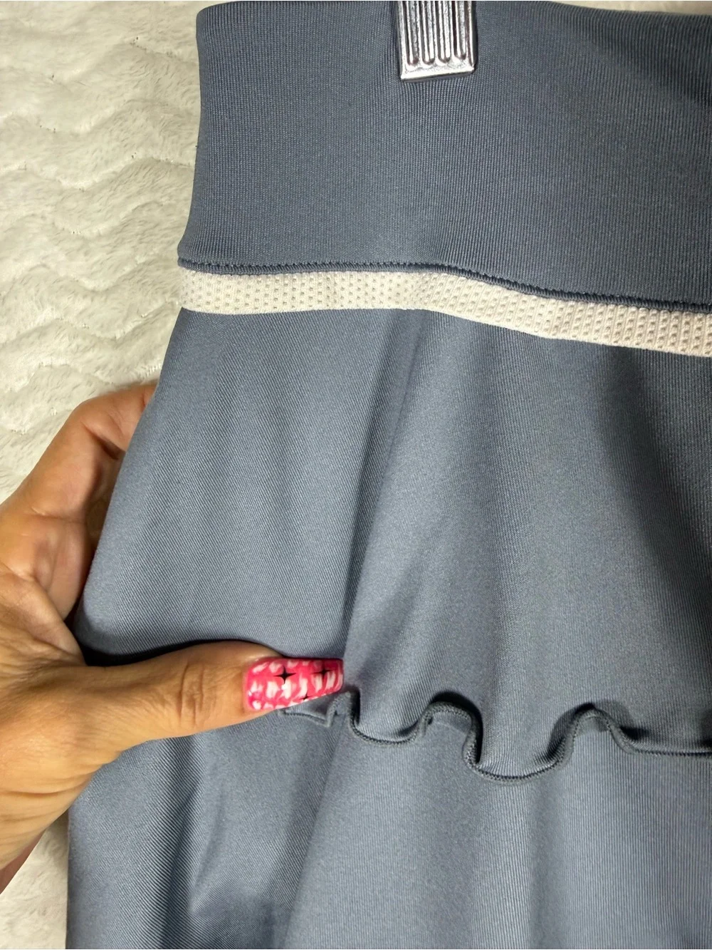Nike Women's Gray Ruffle Tennis Skort with Contrast Trim. Look good on the court